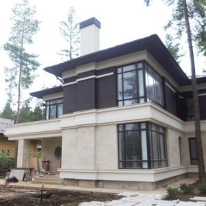 деревянный фасад из планкена и штукатурки