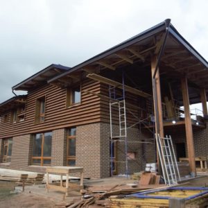 фасад из планкена и штукатурки